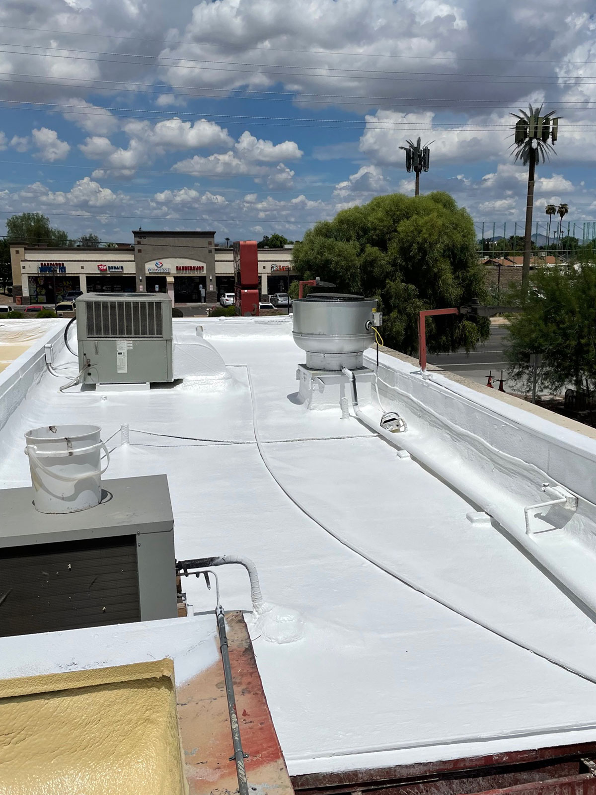 Foam Roof installation in Phoenix AZ Vaqueros Carne Asada