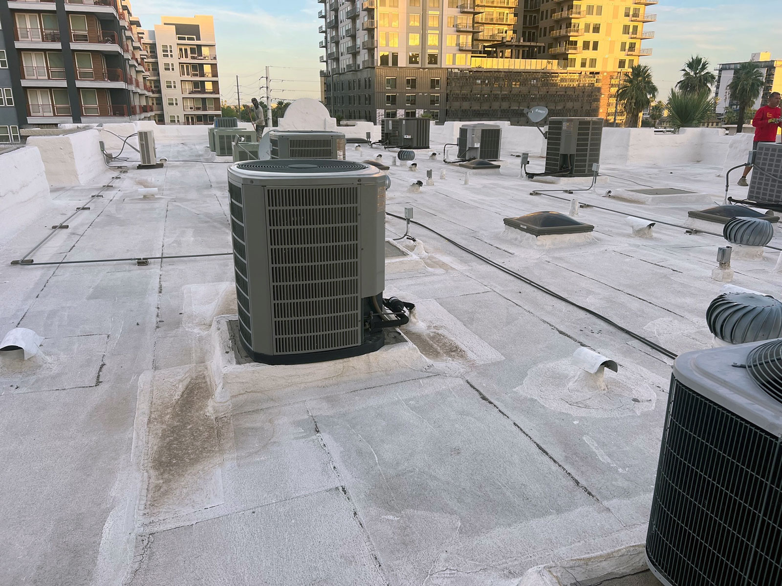 Commercial foam roof with rooftop HVAC equipment on an Arizona commercial building Commercial foam roof with rooftop HVAC equipment on an Arizona commercial building