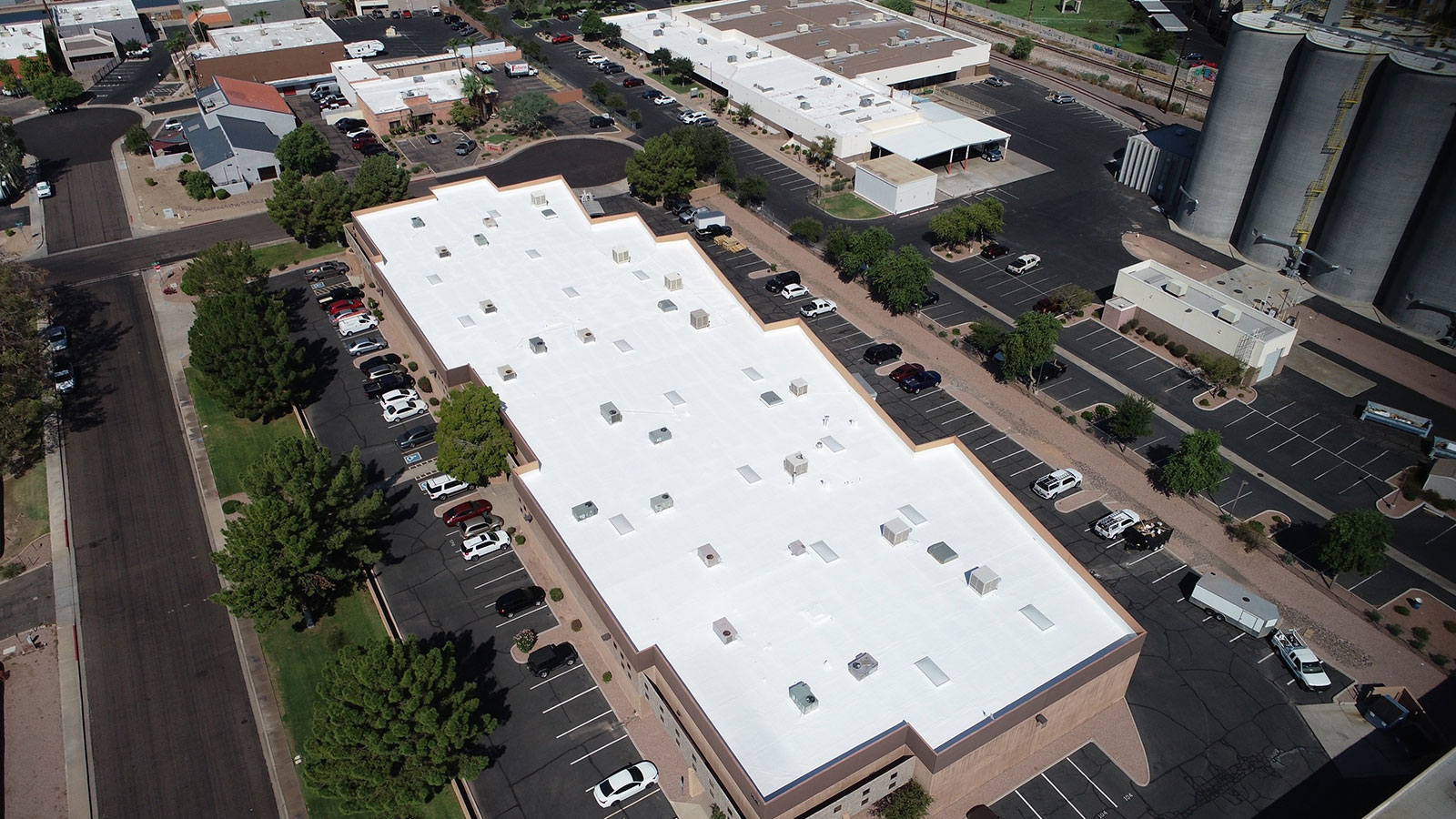Maintained commercial foam roof with white protective coating in Arizona Maintained commercial foam roof with white protective coating in Arizona